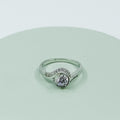 Locked Twirl Solitaire Ring